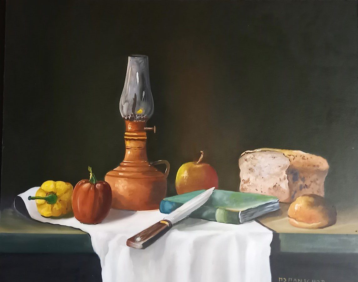 Nature morte avec lampe à huile et pain aux raisins.