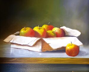 Nature morte de pommes dans une boîte.